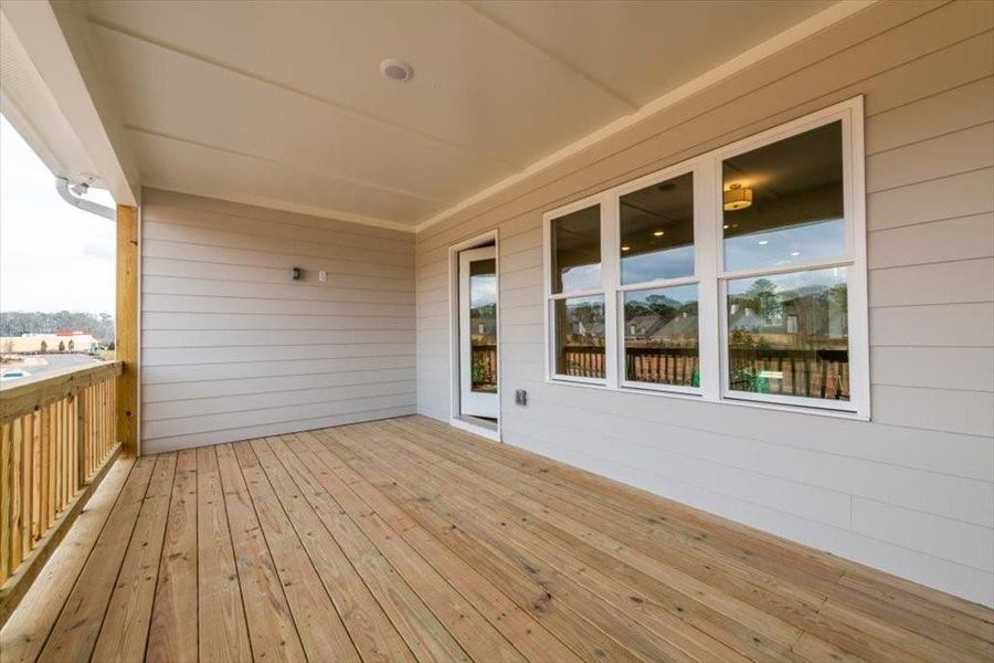 Exterior details and patio area of a home in Townes at South Main, Kennesaw (Image 25).