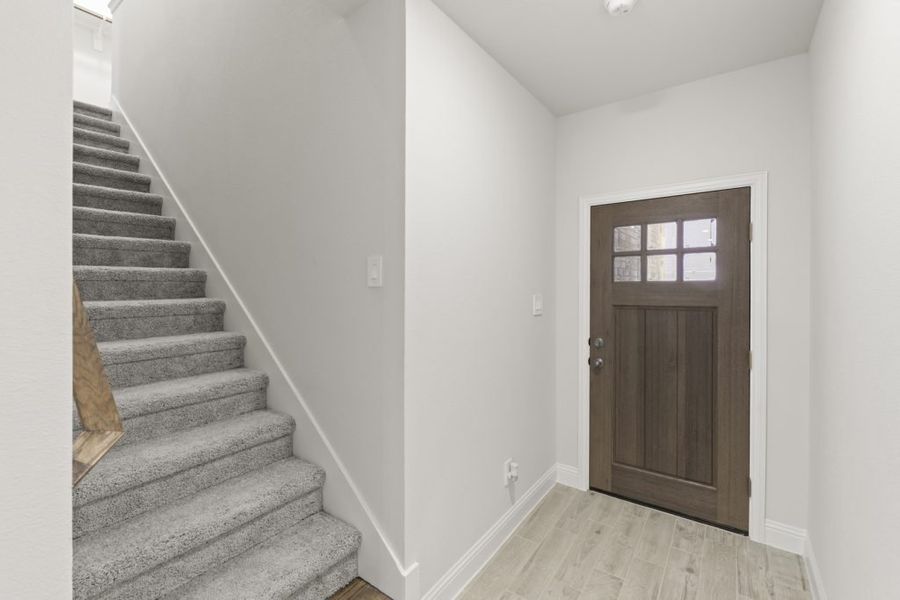 Front exterior of a new home in Sereno Oaks at Buckner Terrace, Dallas, TX, highlighting curb appeal (Image 5). Front exterior of a new home in Sereno Oaks at Buckner Terrace, Dallas, TX, highlighting curb appeal (Image 5).