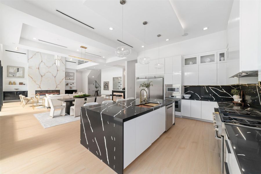 The tour continues into a chef's kitchen.
