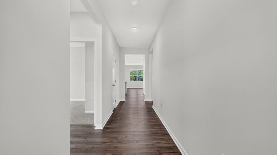Spacious, unfurnished interior of a new home in The Grove at Matthews Landing, Fuquay Varina (Image 14).