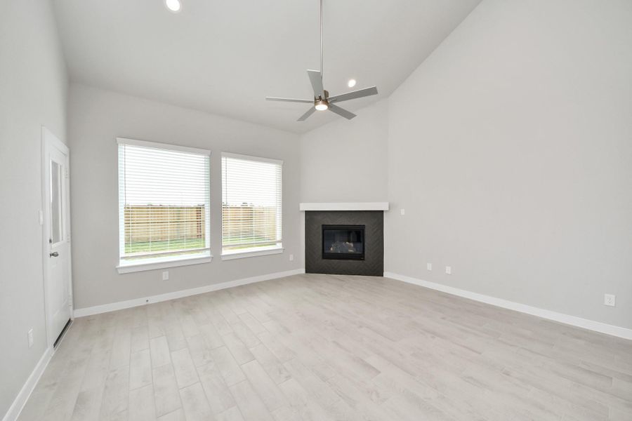 Take another glimpse into the heart of the home with this additional view of the family room—a sprawling space ready to accommodate all your gatherings. Sample photo of completed home with similar floor plan. Actual colors and selections may vary. Take another glimpse into the heart of the home with this additional view of the family room—a sprawling space ready to accommodate all your gatherings. Sample photo of completed home with similar floor plan. Actual colors and selections may vary.