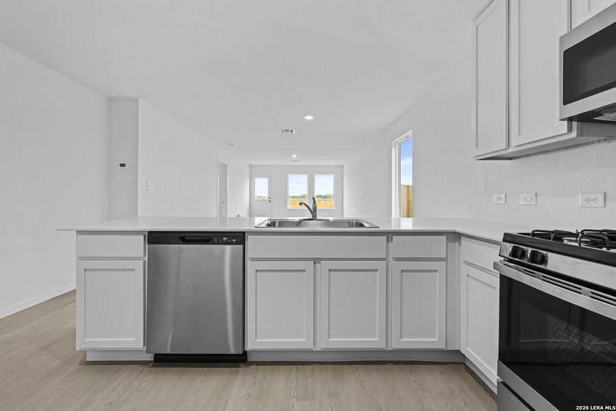 Furnished interior view inside a new home in Spring Grove, St. Hedwig (Image 6).