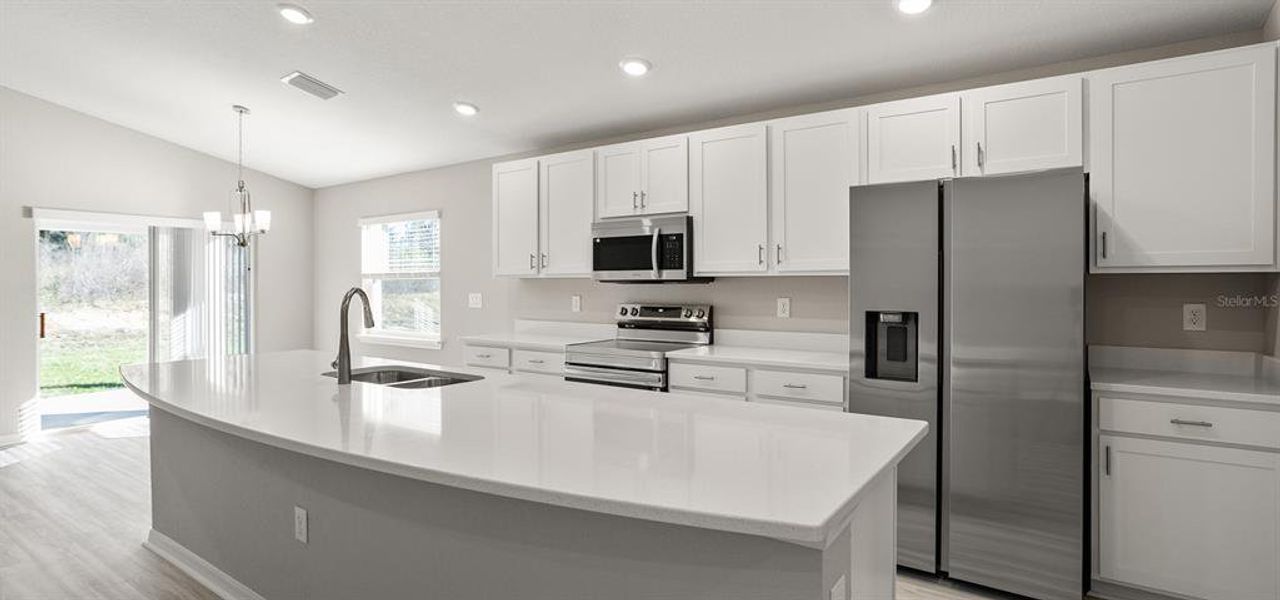Furnished interior view inside a new home in Bennah Oaks, Belleview (Image 6).