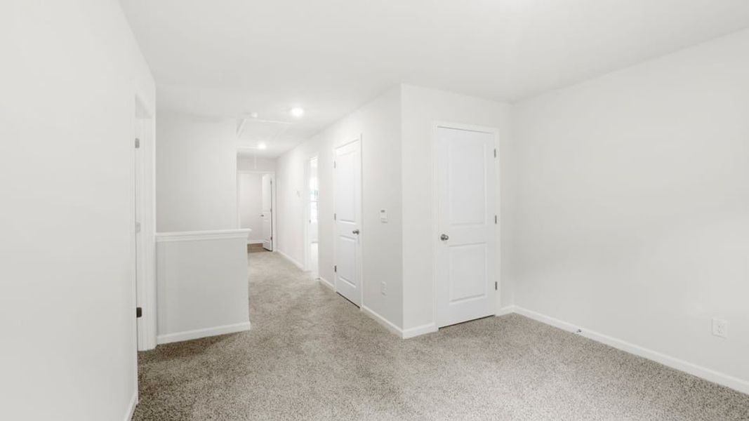 Spacious, unfurnished interior of a new home in Bentley Park, Greenwood (Image 26). Spacious, unfurnished interior of a new home in Bentley Park, Greenwood (Image 26).