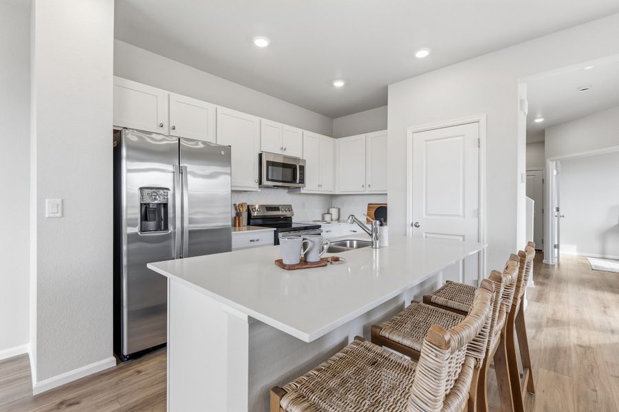 Furnished interior view inside a new home in Windler, Aurora (Image 6).