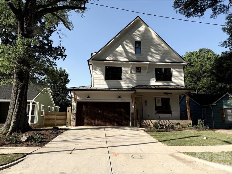 Front exterior of a new home in , Charlotte, NC, highlighting curb appeal (Image 1). Front exterior of a new home in , Charlotte, NC, highlighting curb appeal (Image 1).