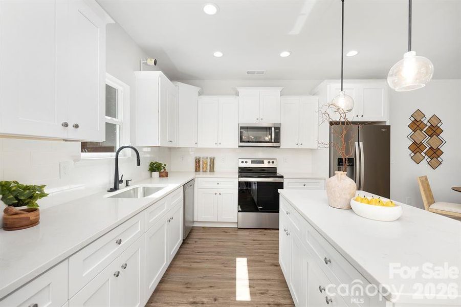Furnished interior view inside a new home in , Charlotte (Image 8). Furnished interior view inside a new home in , Charlotte (Image 8).
