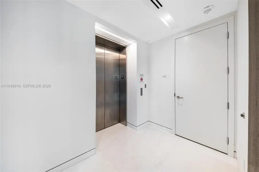 Spacious, unfurnished interior of a new home in Aston Martin Residences, Miami (Image 44).