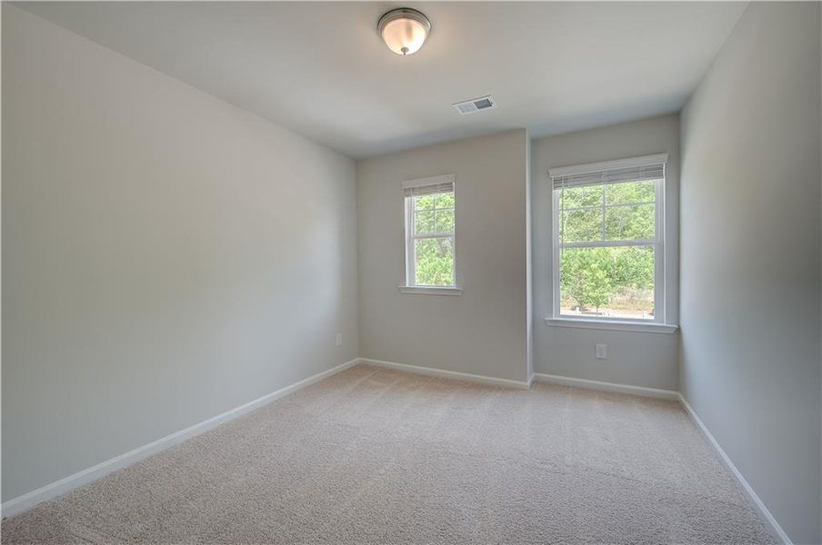 Spacious, unfurnished interior of a new home in Avery Landing, McDonough (Image 17).