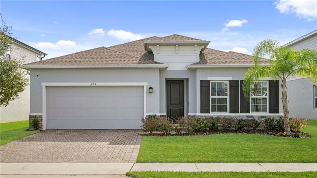 Front exterior of a new home in , Daytona Beach, FL, highlighting curb appeal (Image 1).