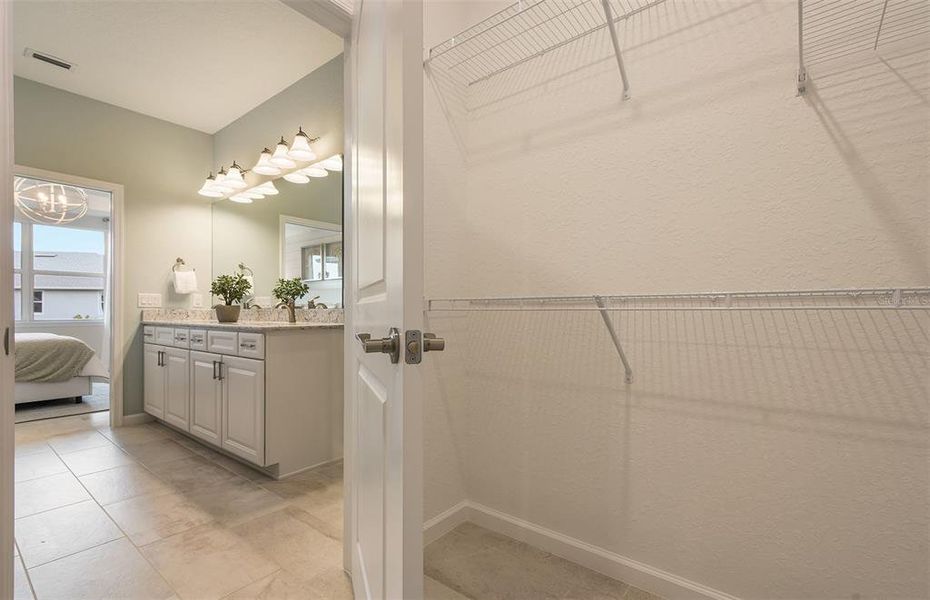 Furnished interior view inside a new home in Tohoqua Reserve, Kissimmee (Image 14).