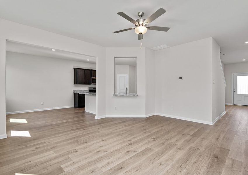 The kitchen, dining room and living room are all connected. The kitchen, dining room and living room are all connected.