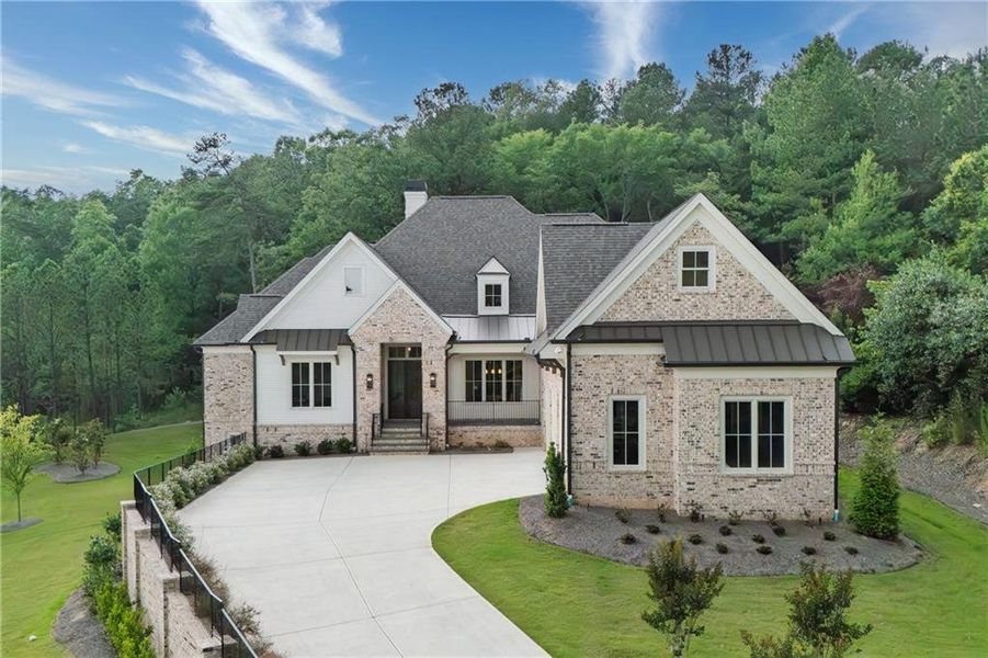 Front exterior of a new home in The Reserve At Governors Towne Club, Acworth, GA, highlighting curb appeal (Image 23).