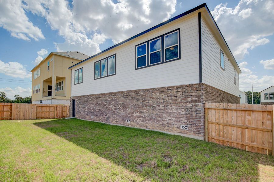 Front exterior of a new home in Townsen Landing, Humble, TX, highlighting curb appeal (Image 19).