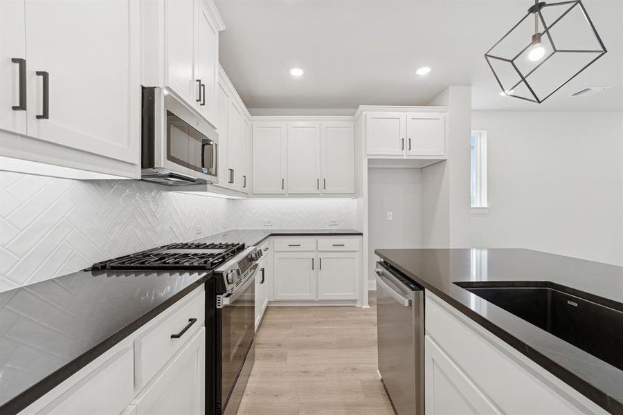 Furnished interior view inside a new home in Painted Tree Woodland West – Cottages, McKinney (Image 10). Furnished interior view inside a new home in Painted Tree Woodland West – Cottages, McKinney (Image 10).