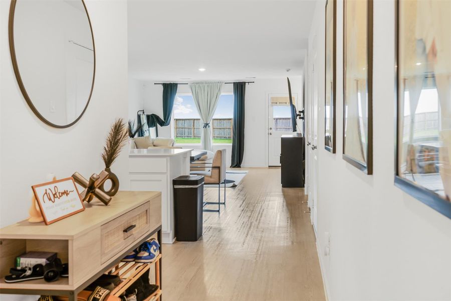 As soon as you walk in you have a bright, inviting entryway leading into an open concept living/dining space