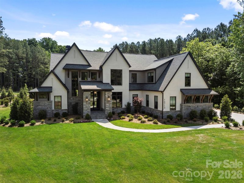 Front exterior of a new home in , Charlotte, NC, highlighting curb appeal (Image 1). Front exterior of a new home in , Charlotte, NC, highlighting curb appeal (Image 1).