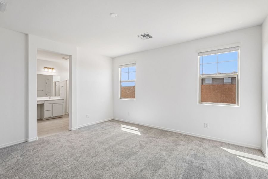 Spacious, unfurnished interior of a new home in Hawes Crossing, Mesa (Image 22).