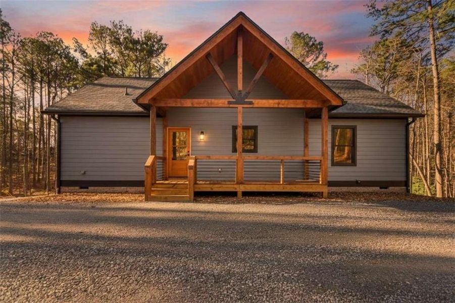 Exterior details and patio area of a home in , Ellijay (Image 24).