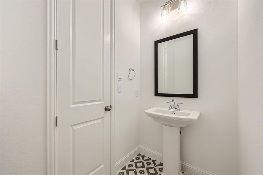 Bathroom with tile flooring