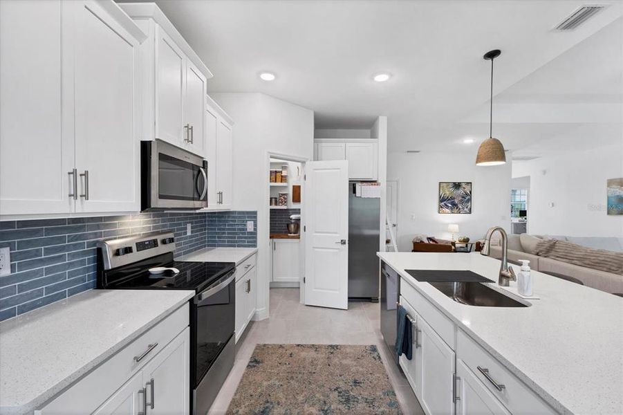 Furnished interior view inside a new home in , Port Charlotte (Image 9).