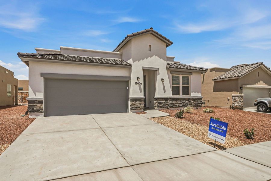 Front exterior of a new home in Hillside Park, El Paso, TX, highlighting curb appeal (Image 19).