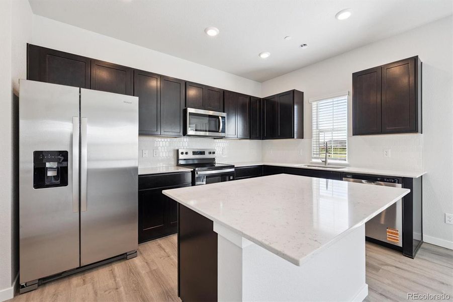 Furnished interior view inside a new home in Legato, Commerce City (Image 5).
