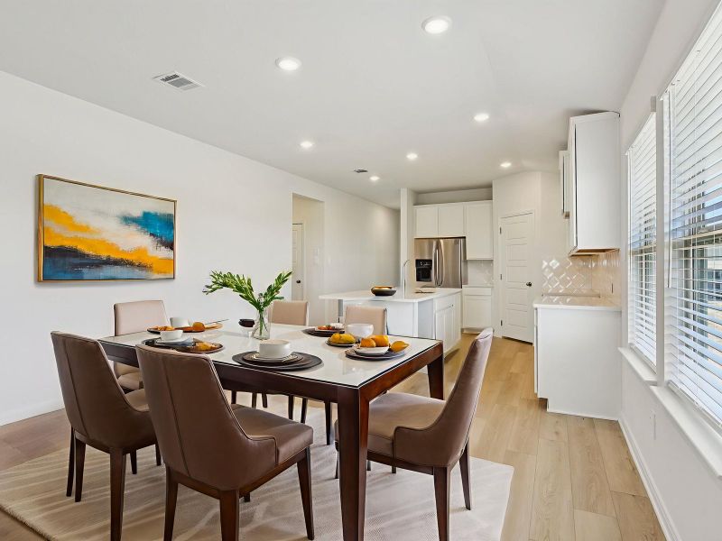 Virtually staged dining room in the Allen floorplan at a Meritage Homes community. Virtually staged dining room in the Allen floorplan at a Meritage Homes community.