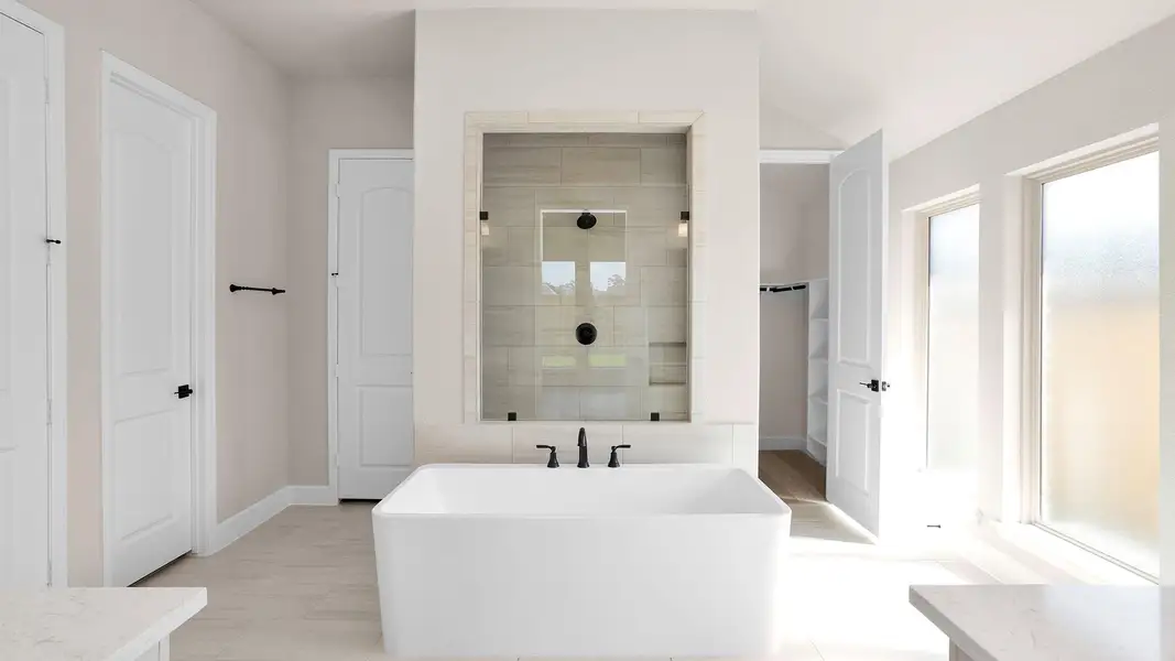 Furnished interior view inside a new home in Grand Central Park 50', Conroe (Image 5).