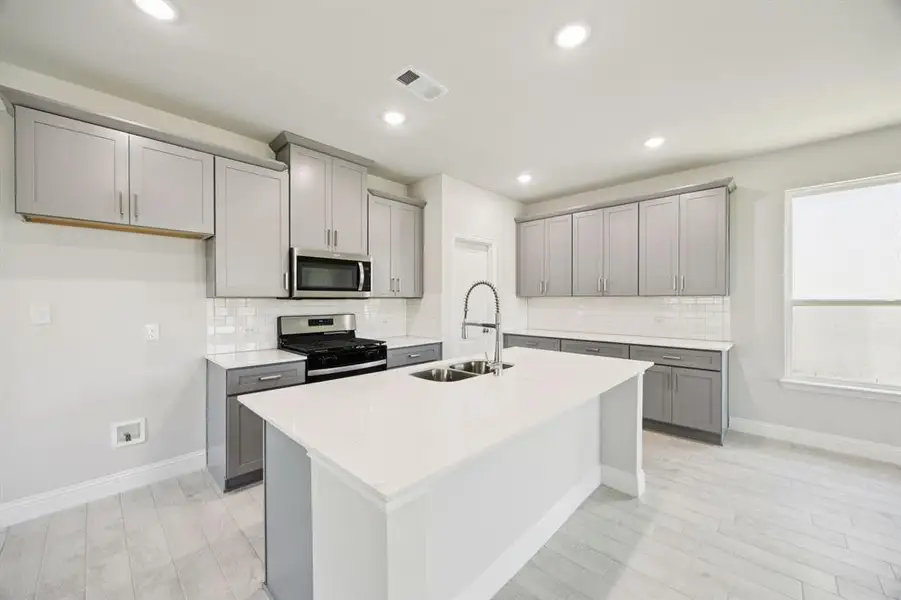 Furnished interior view inside a new home in Santorini, Seagoville (Image 4).