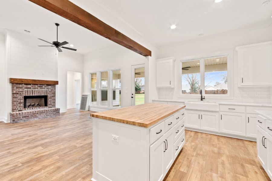 Representative furnished interior of a home built from the The Charlotte by Manuel Builders in Chapel Bend, Montgomery (Image 10).