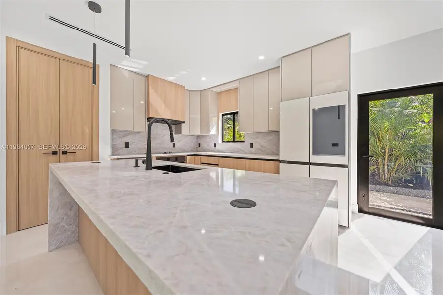 Furnished interior view inside a new home in , North Miami (Image 7).