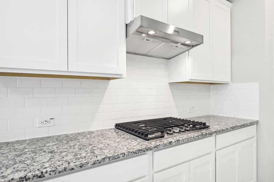 Kitchen in the Oleander floorplan at a Meritage Homes community. Kitchen in the Oleander floorplan at a Meritage Homes community.