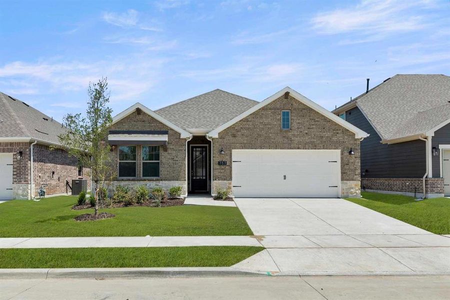 Front exterior of a new home in Coyote Meadows, Anna, TX, highlighting curb appeal (Image 18).