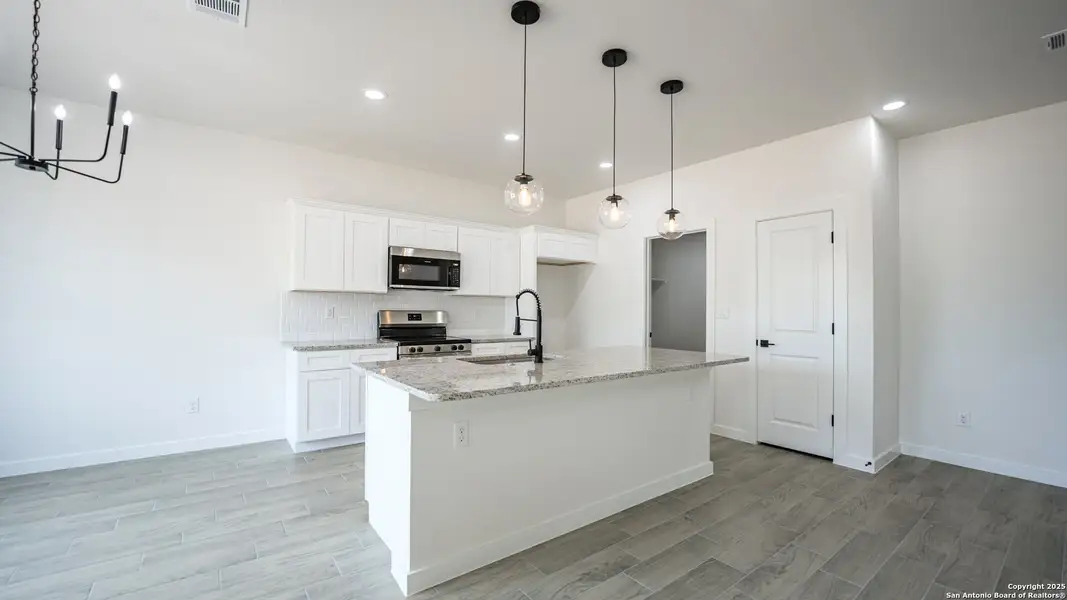Furnished interior view inside a new home in , Atascosa (Image 4). Furnished interior view inside a new home in , Atascosa (Image 4).