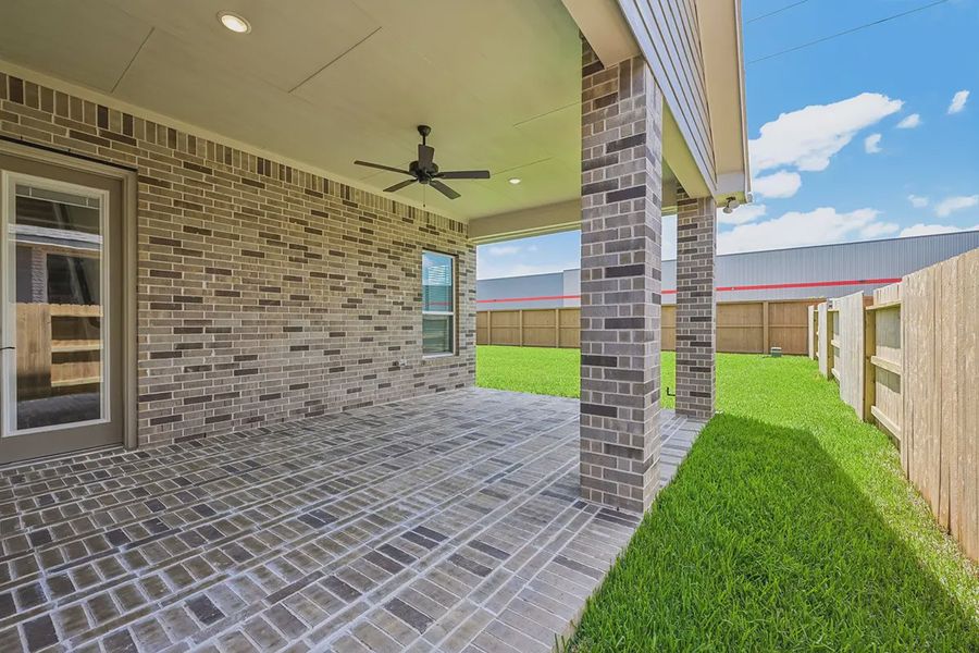Exterior details and patio area of a home in Wood Leaf Reserve, Tomball (Image 23). Exterior details and patio area of a home in Wood Leaf Reserve, Tomball (Image 23).