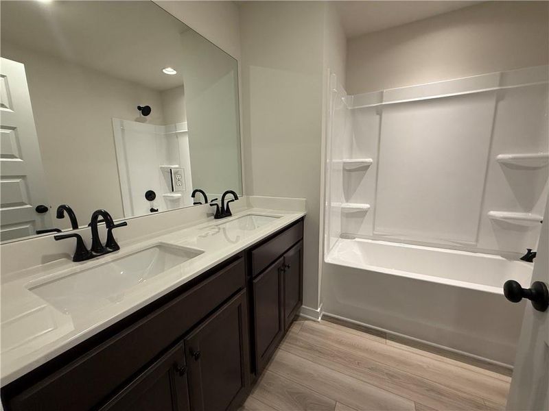Furnished interior view inside a new home in The Towns at Auburn Station East, Auburn (Image 9).