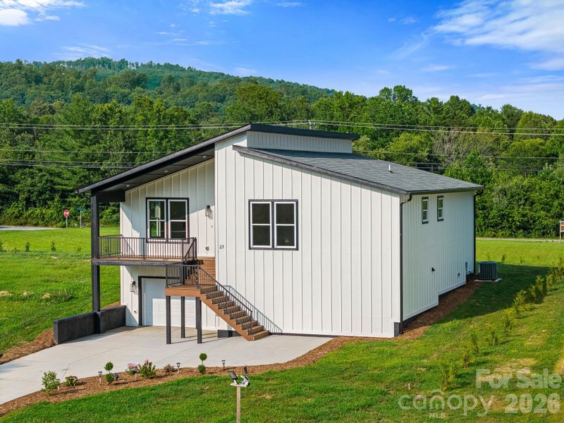 Exterior details and patio area of a home in , Hendersonville (Image 26).
