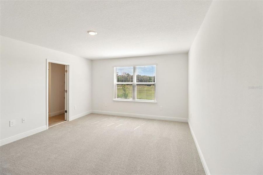 Spacious, unfurnished interior of a new home in The Reserve at Hammock Oaks - Classic Series, Lady Lake (Image 30).