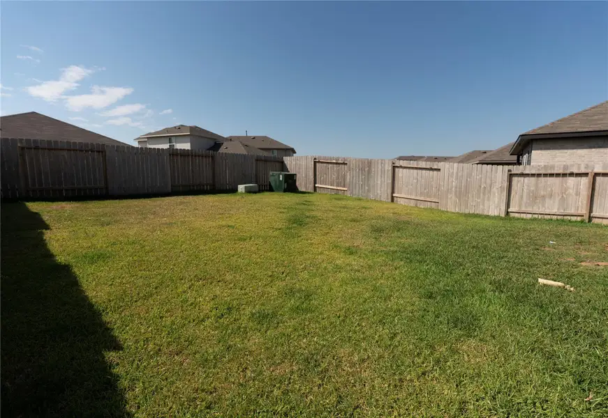 Exterior details and patio area of a home in , Spring (Image 2). Exterior details and patio area of a home in , Spring (Image 2).