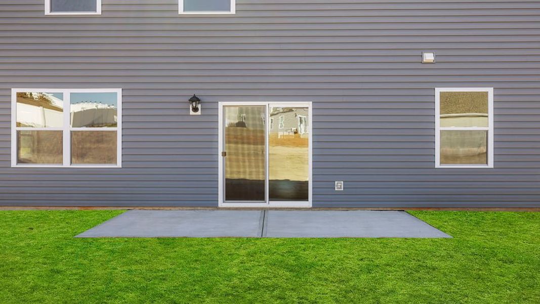 Exterior details and patio area of a home in Waverly Station, Greenwood (Image 20).