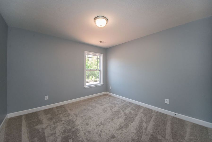 Representative unfurnished interior of a home built from the Jackson by Enchanted Homes in Lonesome Dove, San Antonio (Image 43).