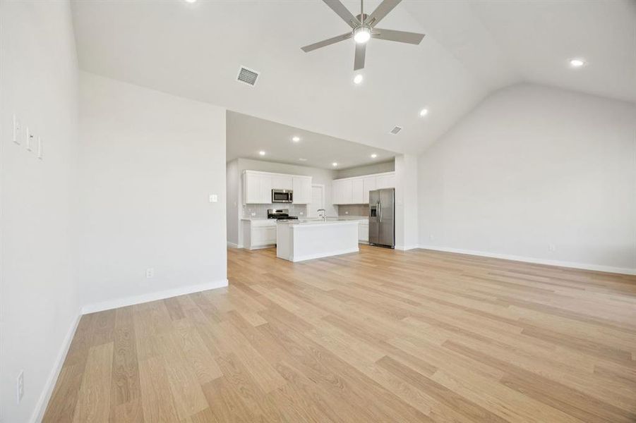 Open Floor Plan in the Masters home plan by Trophy Signature Homes – REPRESENTATIVE PHOTO