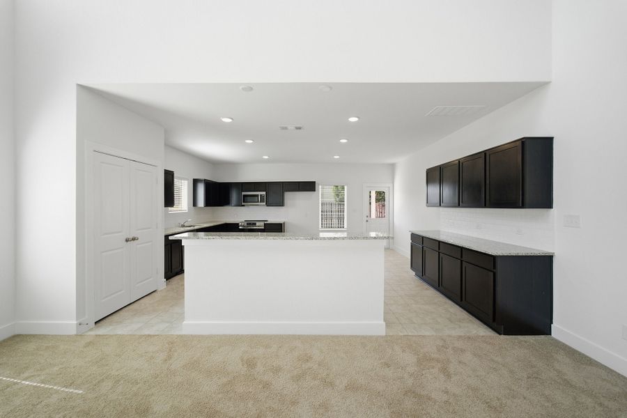 Furnished interior view inside a new home in Grande Estates, Bertram (Image 7).