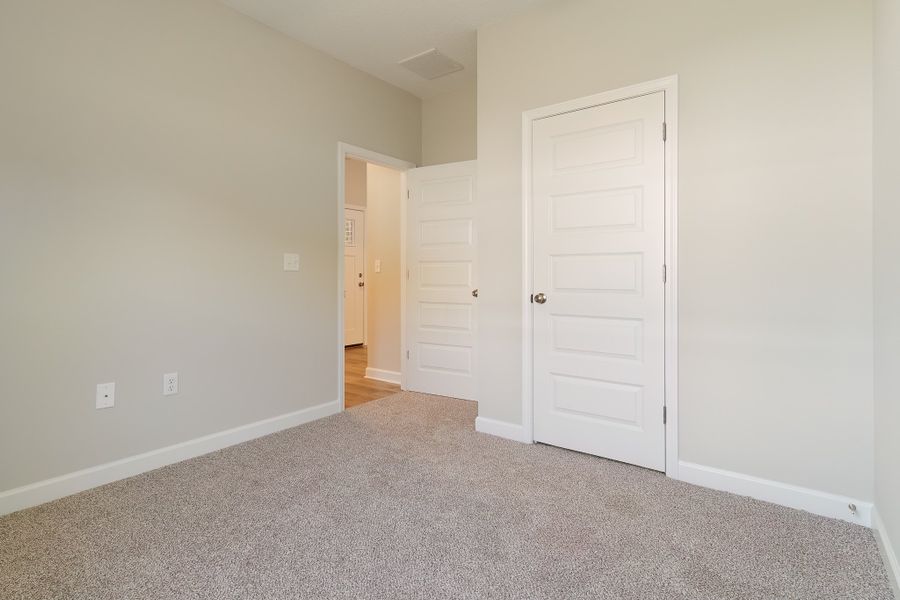 Representative unfurnished interior of a home built from the Maybell III by CJL Homes in Barton's Bend, Crestview (Image 22).
