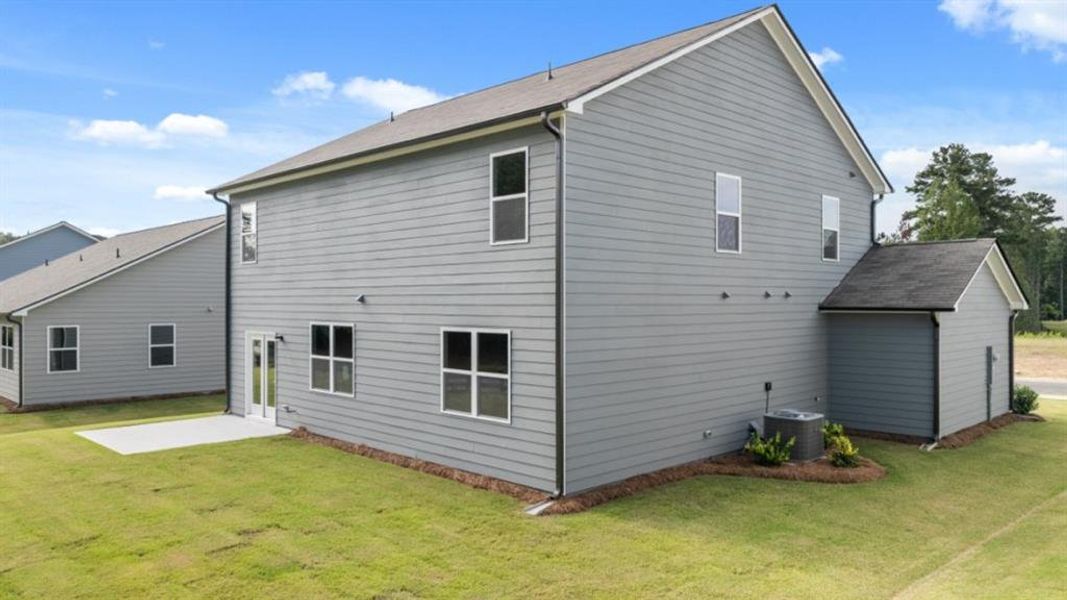 Exterior details and patio area of a home in Fairway 17 at Mirror Lake, Villa Rica (Image 21). Exterior details and patio area of a home in Fairway 17 at Mirror Lake, Villa Rica (Image 21).