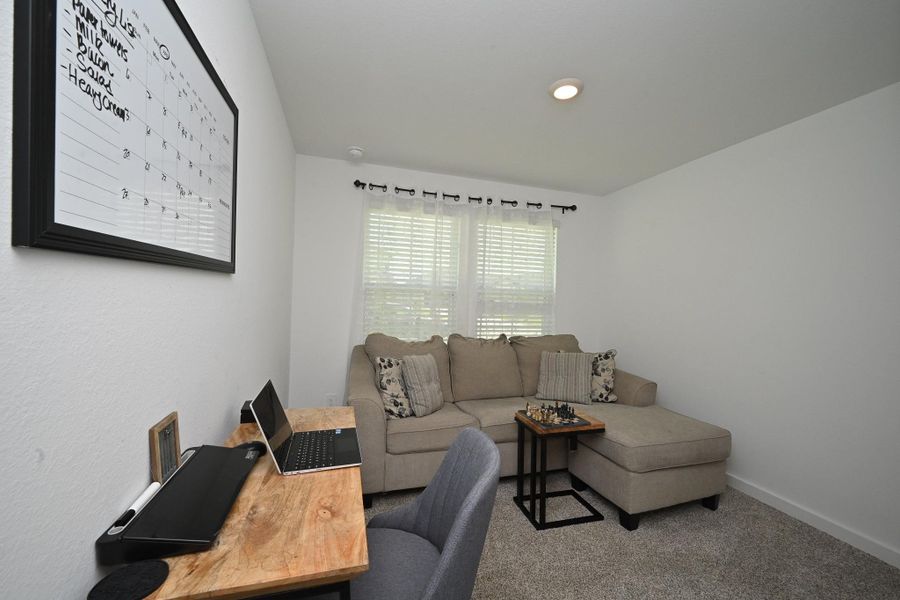The front bedroom has a large window for natural light. The walls are neutral, enhancing the bright and inviting atmosphere. Can be used as a home office as well! The front bedroom has a large window for natural light. The walls are neutral, enhancing the bright and inviting atmosphere. Can be used as a home office as well!