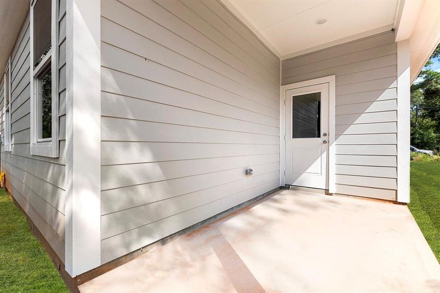 Covered back patio.  Great for relaxing in the morning or evenings.