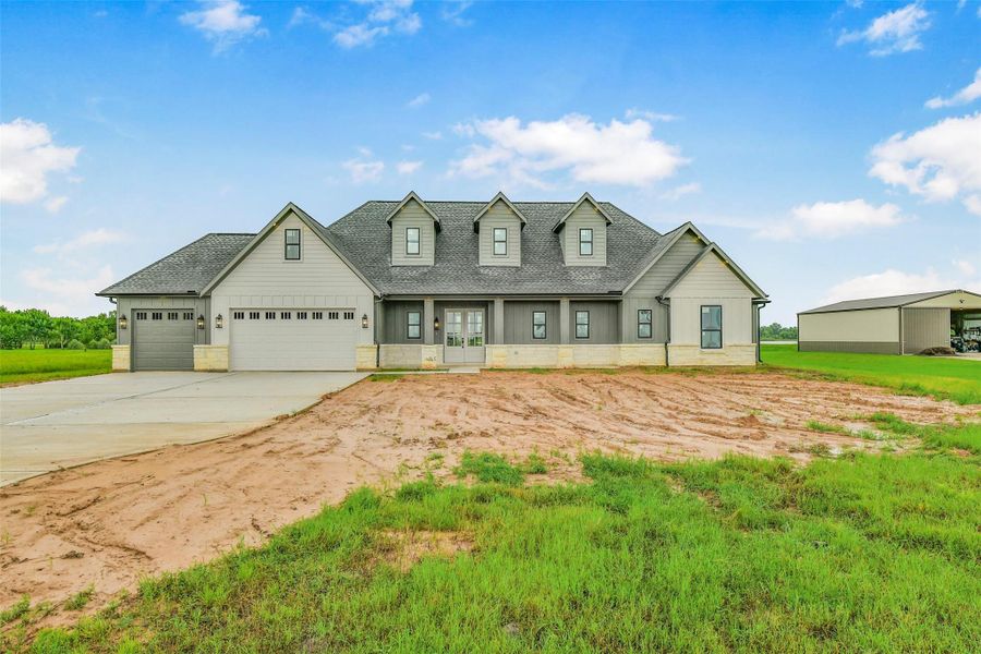 Front exterior of a new home in , Angleton, TX, highlighting curb appeal (Image 2). Front exterior of a new home in , Angleton, TX, highlighting curb appeal (Image 2).