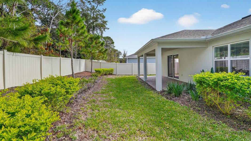 Exterior details and patio area of a home in Canopy Terrace, Deland (Image 27). Exterior details and patio area of a home in Canopy Terrace, Deland (Image 27).